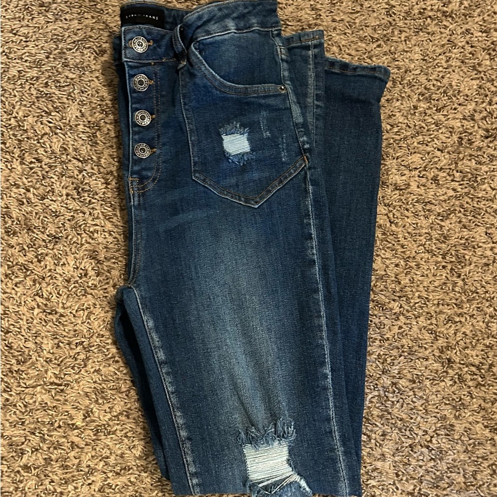 High Rise Blue Distressed Jeans with Faded Details